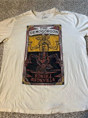 Stranger Things Ivory  Graphic Tee Featuring Demogorgon Poster Art